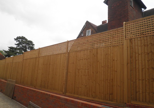 Tall fence with trellis