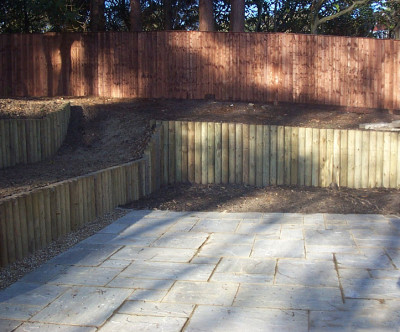 Log Retaining Wall & Close Board Fence