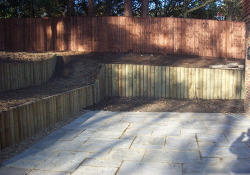 Log Retaining Wall & Close Board Fence